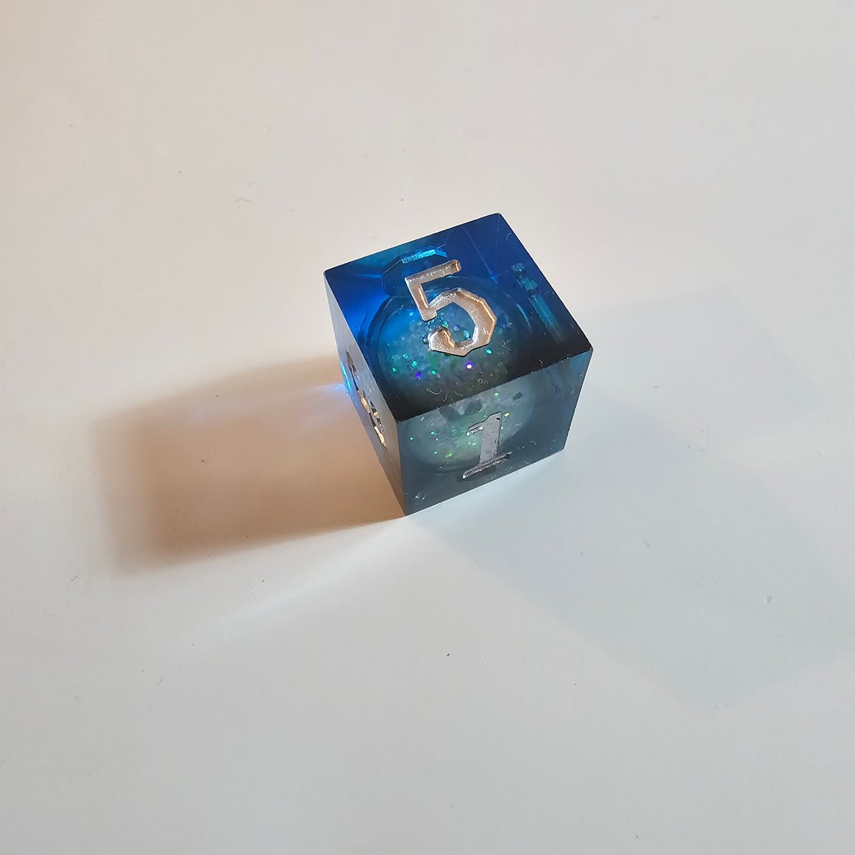 Ocean’s Secret Liquid Core Resin Dice Set