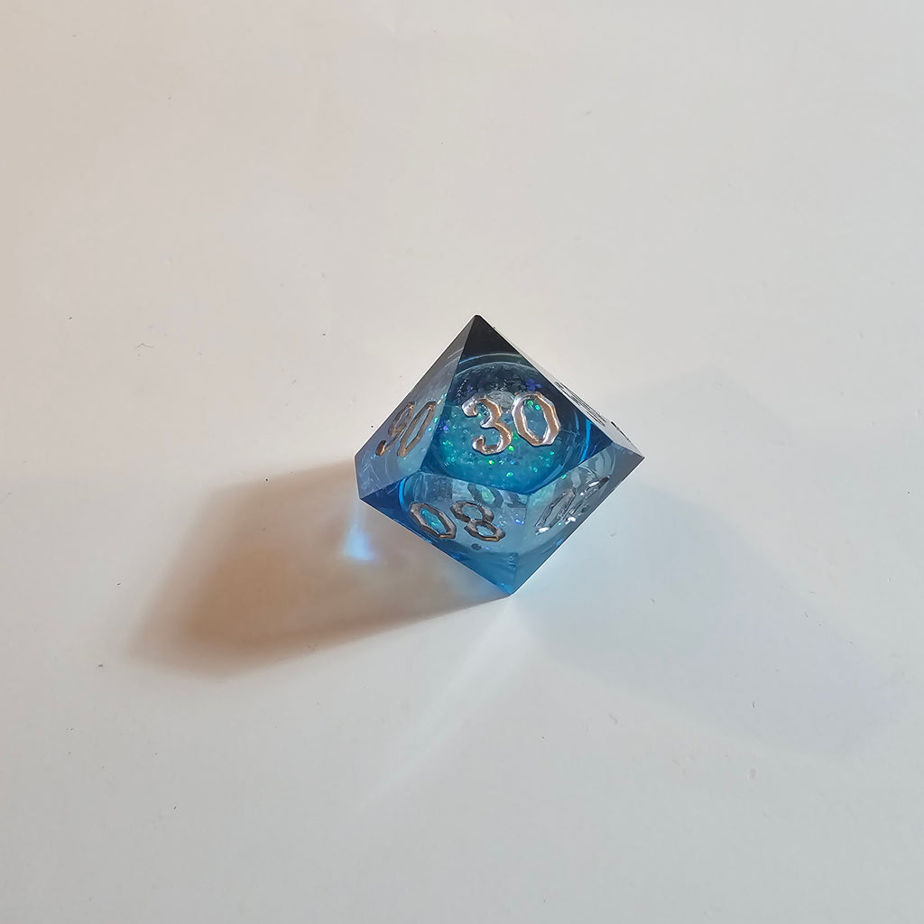 Ocean’s Secret Liquid Core Resin Dice Set