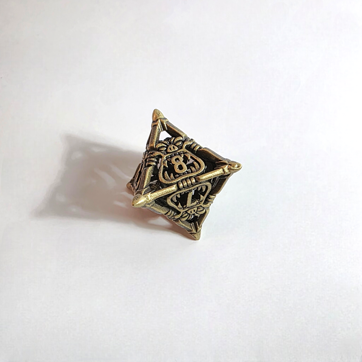 Snarling Mimic Antique Gold Hollow Metal Dice Set