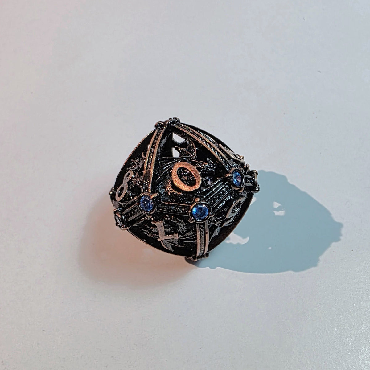 Brass Sapphire Dragoncrown Hollow Metal Dice Set