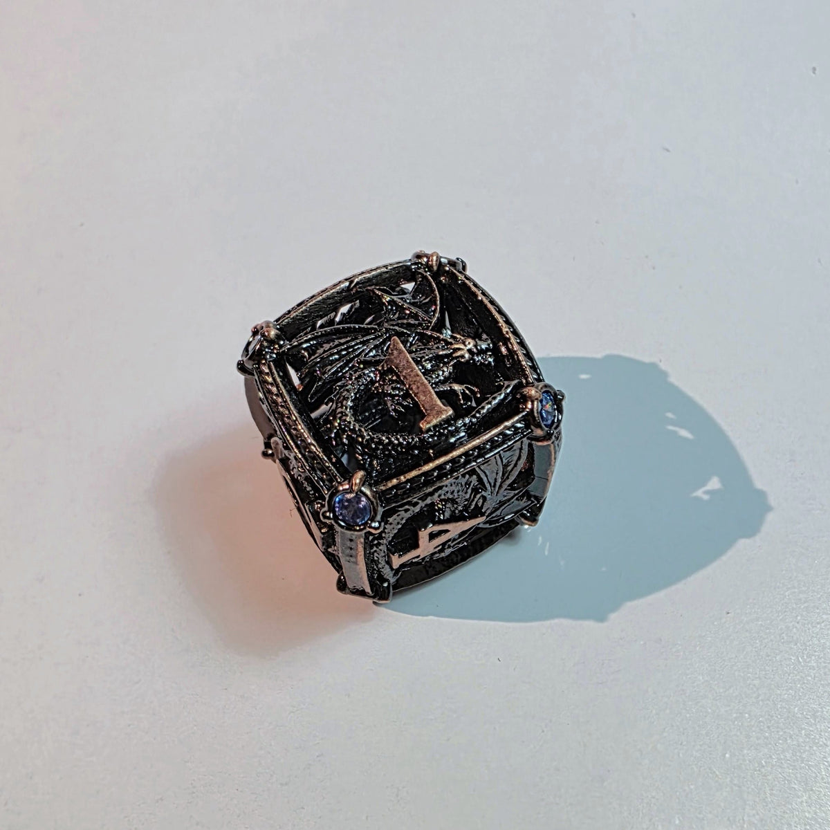 Brass Sapphire Dragoncrown Hollow Metal Dice Set