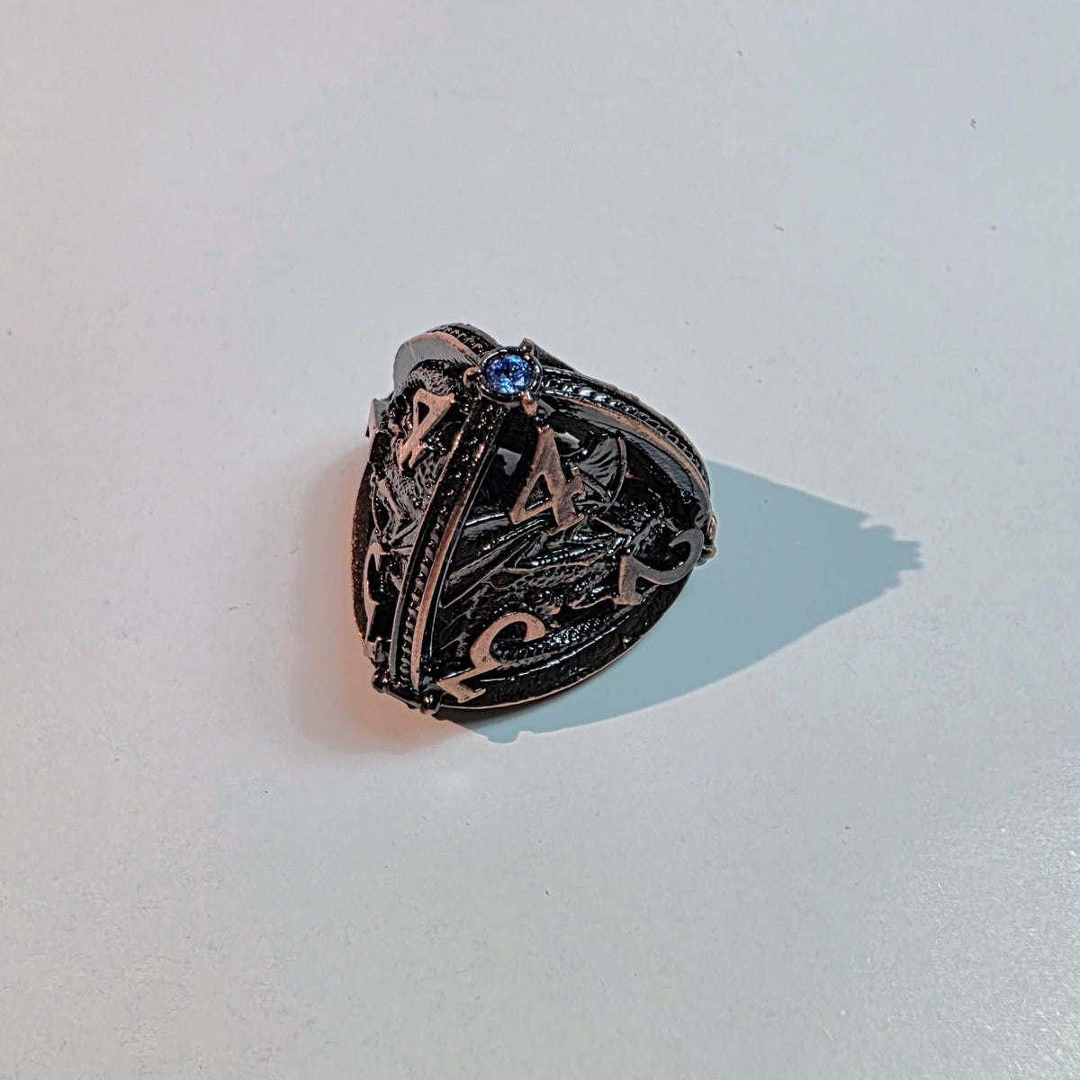 Brass Sapphire Dragoncrown Hollow Metal Dice Set