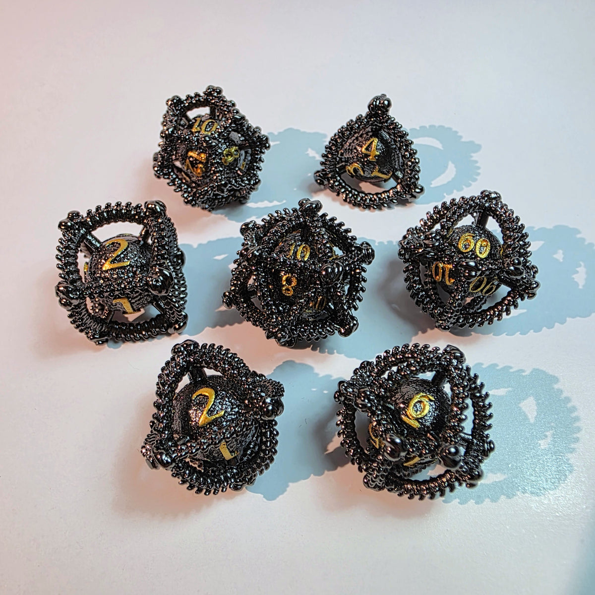 Dragon Egg Black Gold Hollow Metal Dice Set