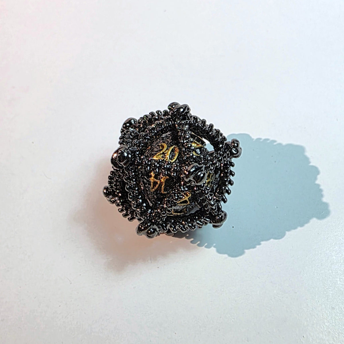 Dragon Egg Black Gold Hollow Metal Dice Set