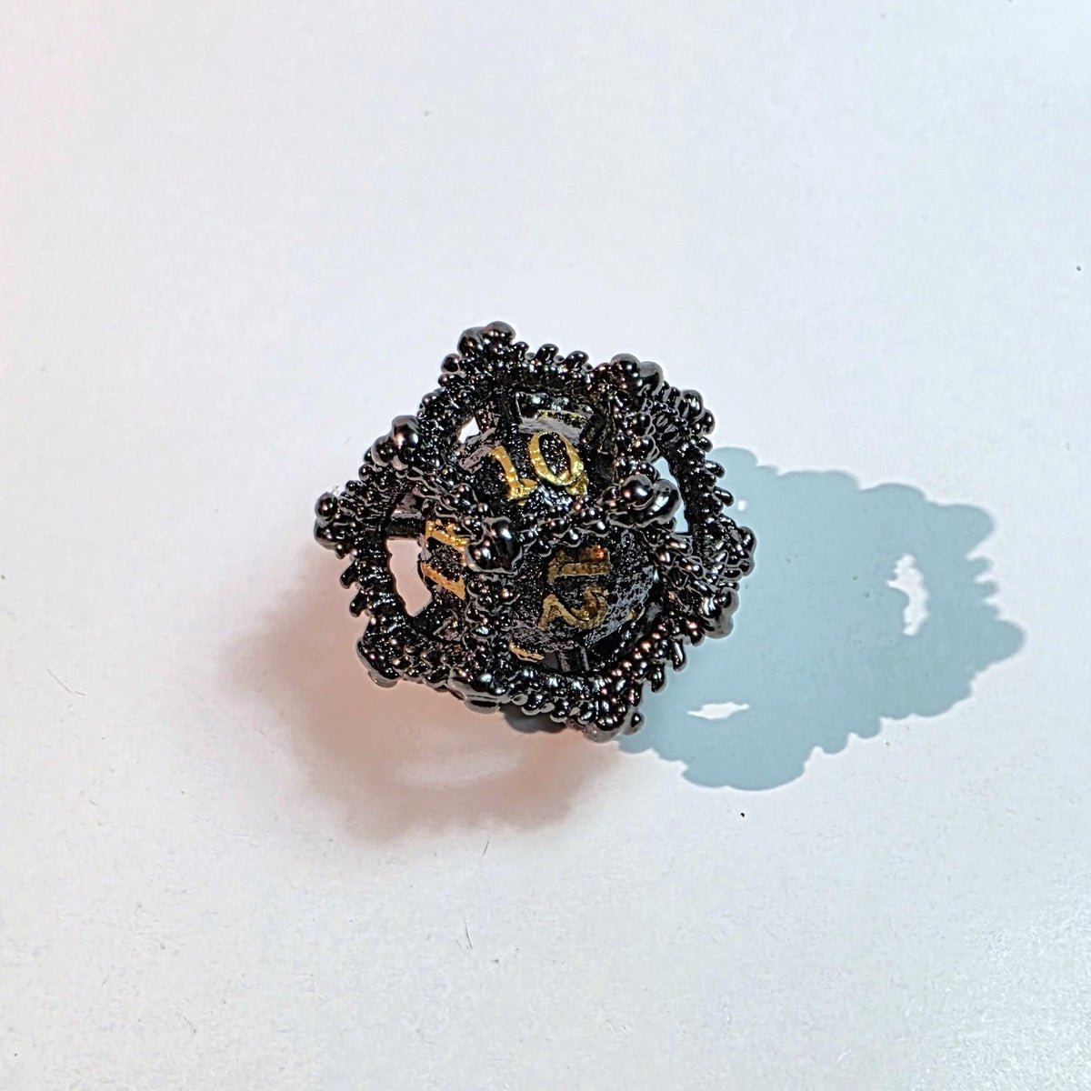 Dragon Egg Black Gold Hollow Metal Dice Set